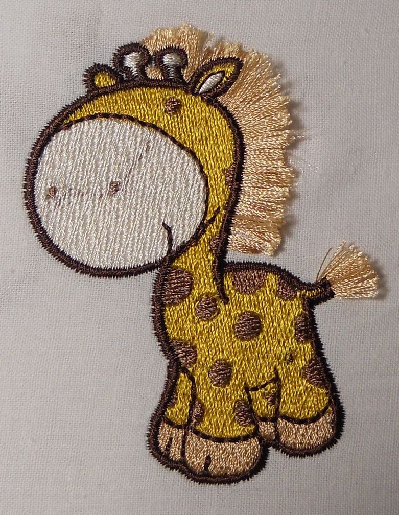 машинная вышивка жираф в технике фриндж